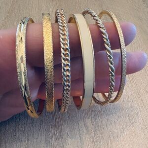 set of 6 gold tone vintage bracelets - Trifari and Monet